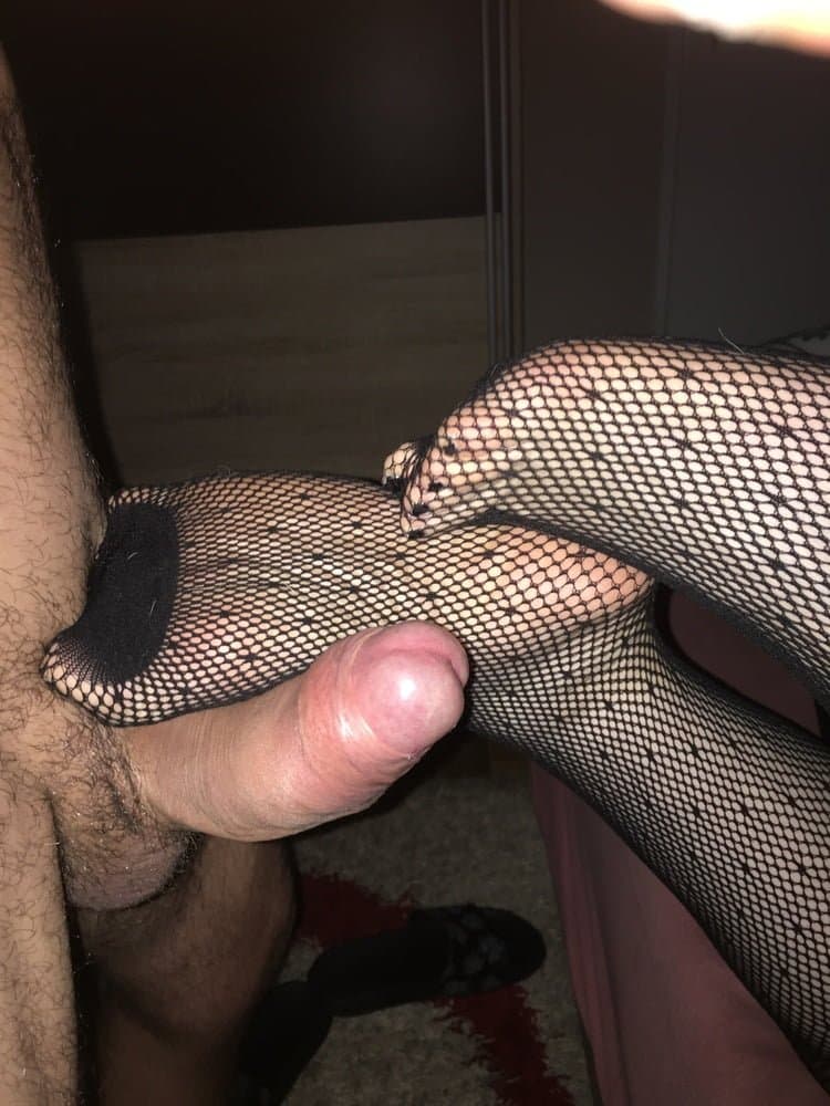 Dad bought me fishnet stockings and told me to take his dick in my feet