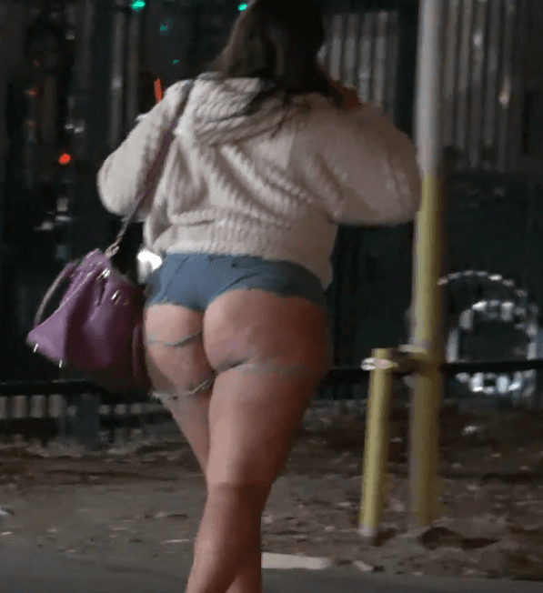 fat cakes latina milf hooker smoking cigarette jean shorts