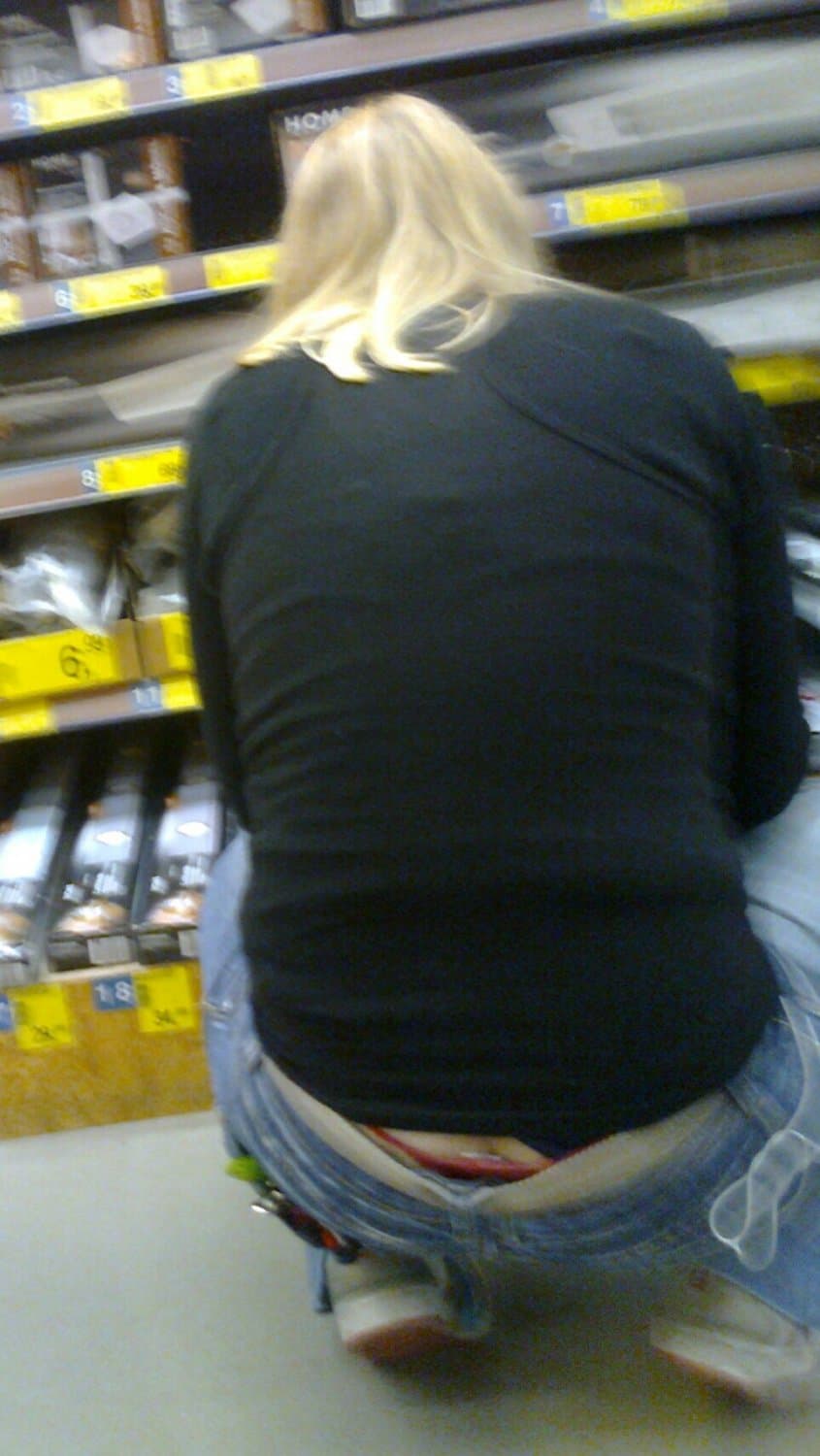 Whaletail red thong and asscrack blonde girl in a shop