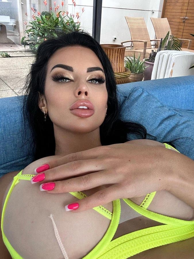 Silicone busty in yellow lingerie