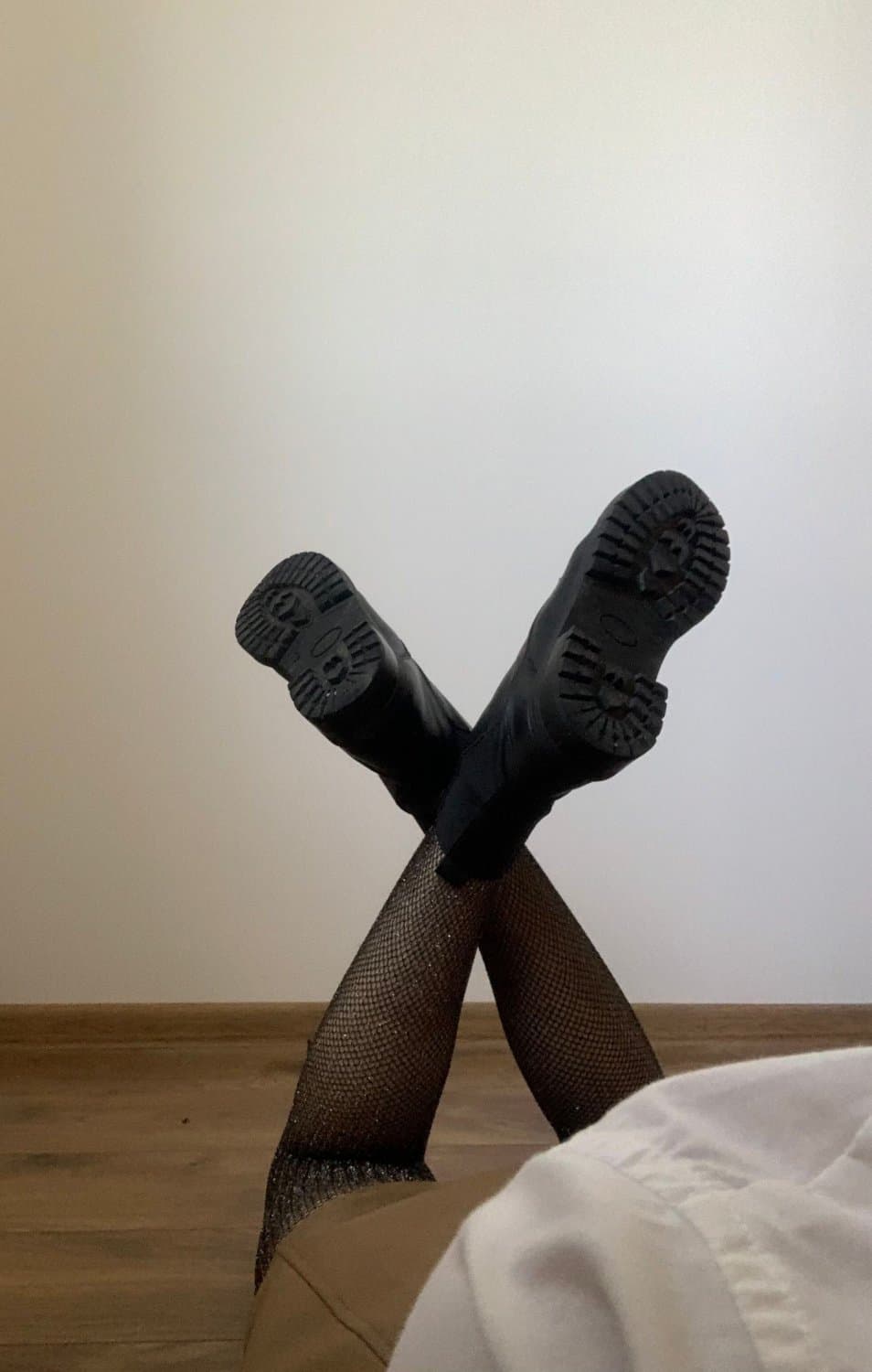 Kate Sissy Cl1412 showing her in leather skirt and fishnets