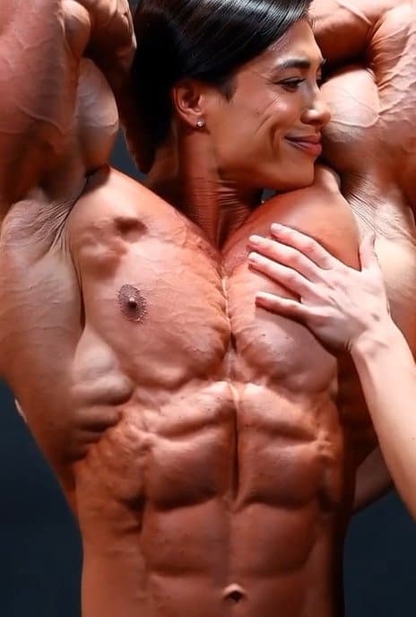 Wild lesbian orgy around her naked roided muscles