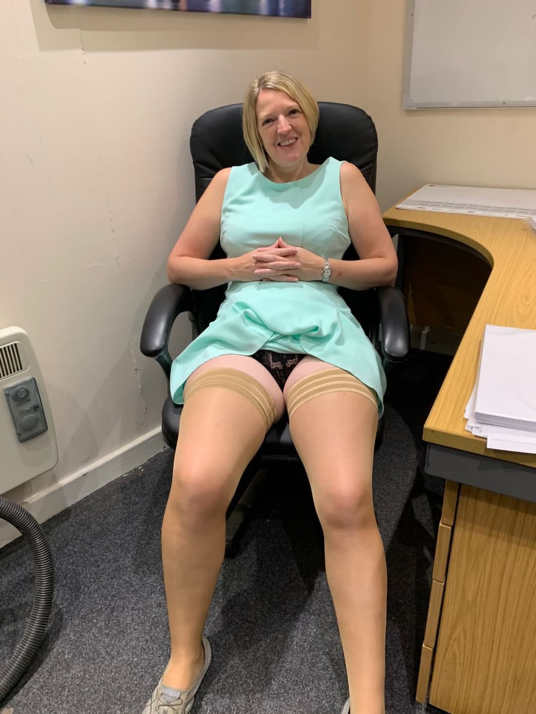 Secretary likes to pose for her boss