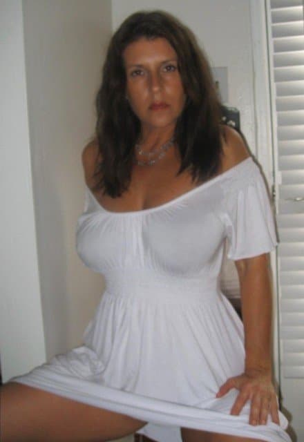 Click to view full size Beautiful mature brunette loves to show off her perfect natural tits
