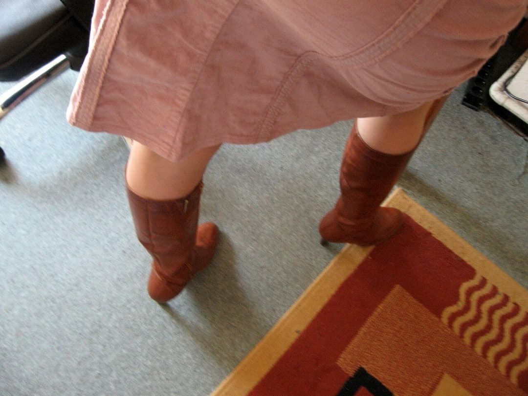 CFNM MILF Nadia with her decent skirt and boots on ,is going to show two young fans what cfnm means