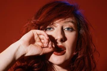 Gorgeous curvy busty ginger MILF