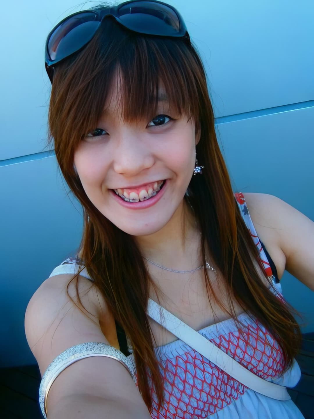 Cute HongKong slut revealing her boobs