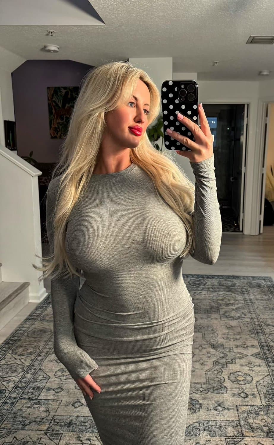 This tight dress hugs every curve, making it impossible to look away