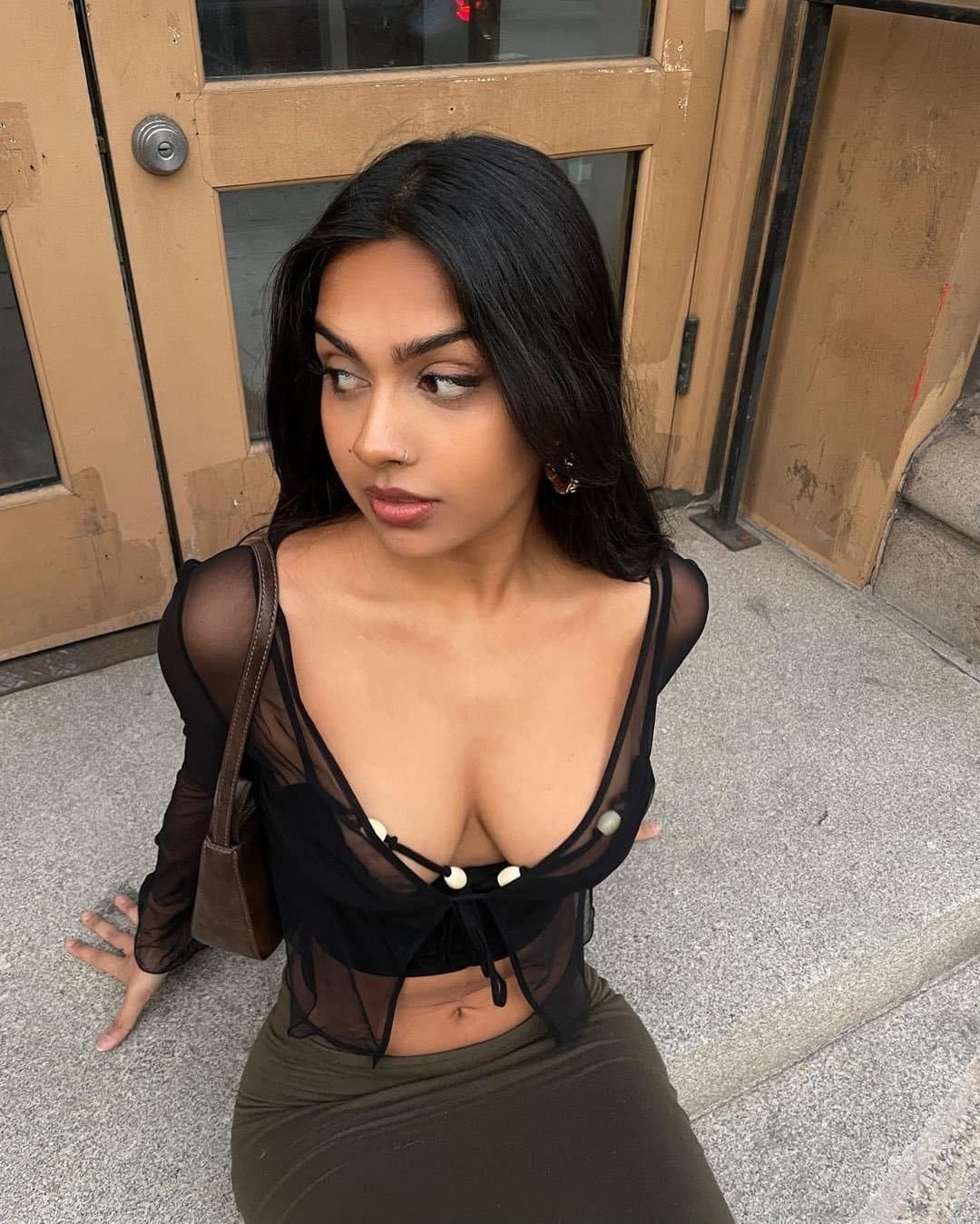 Do yall think this desi camel nigga slut knows we can all see her brown nipples