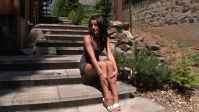 
tanned girl playing with pussy under the sun