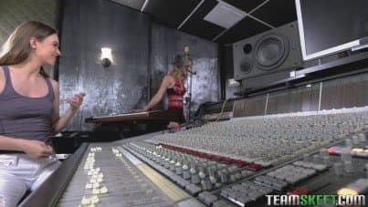 
two cuties in music studio