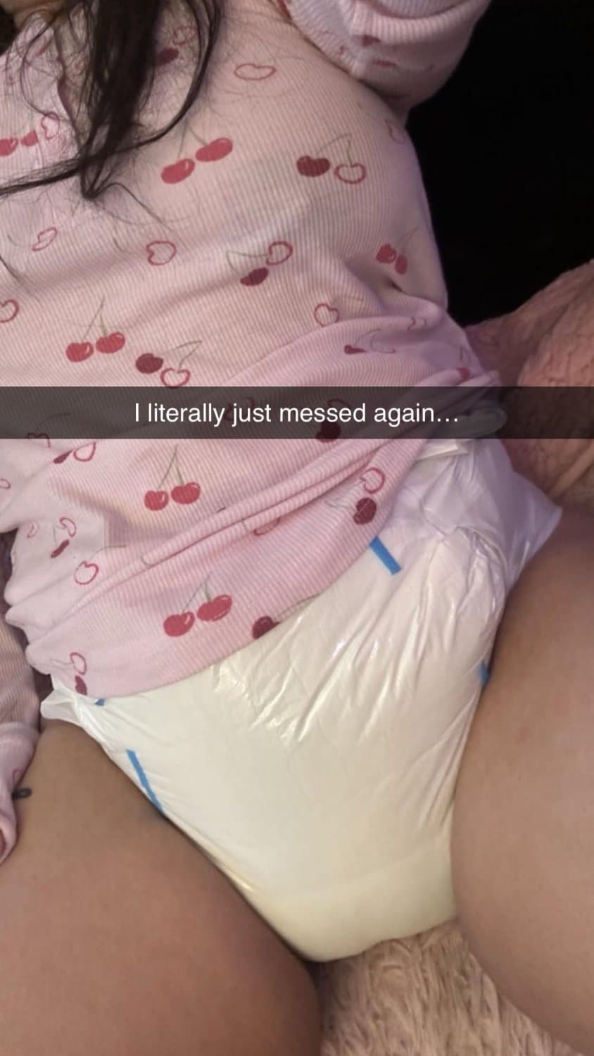 Click to view full size Incontinent college girl doesn’t mind showing off her diapers