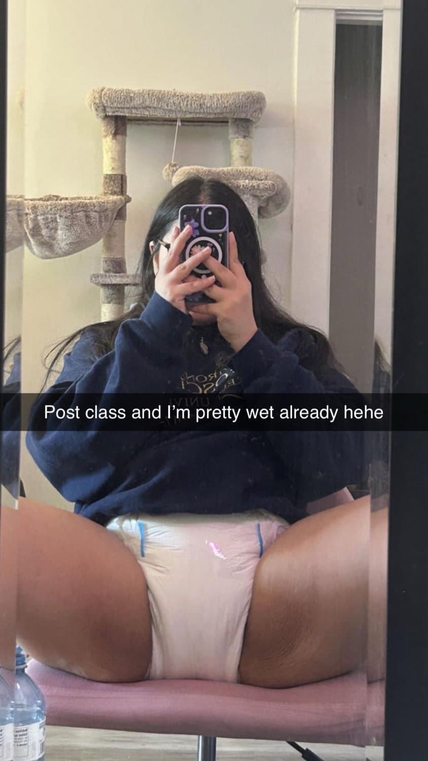 Click to view full size Incontinent college girl doesn’t mind showing off her diapers