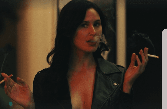 Click to view full size smoking horror hottie from horror movie A