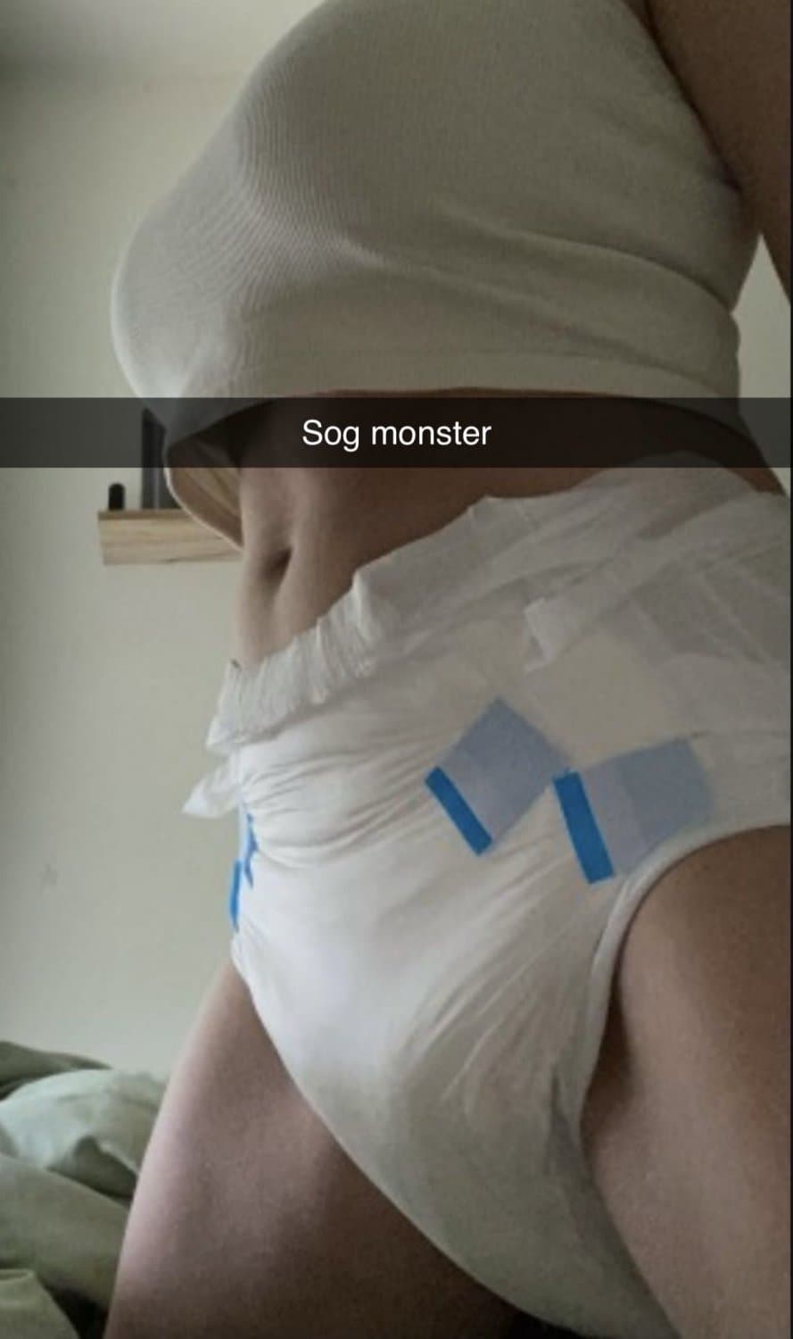 Click to view full size Incontinent college girl doesn’t mind showing off her diapers