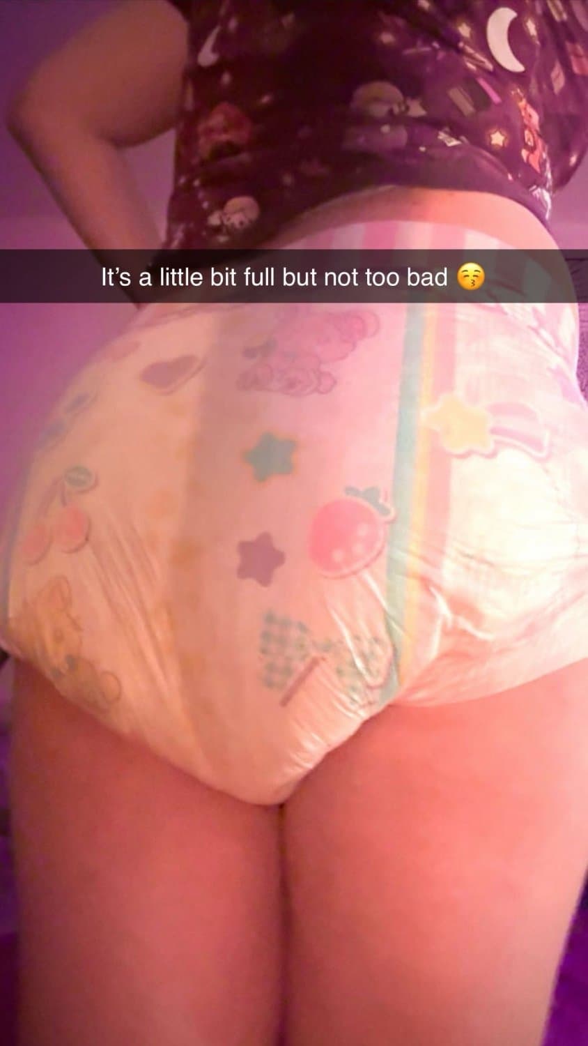 Click to view full size Incontinent college girl doesn’t mind showing off her diapers