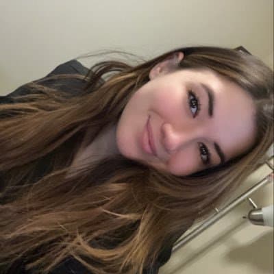 Click to view full size Hottest Milf ever? This curvy slut who loves sticking her tongue out comes damn close