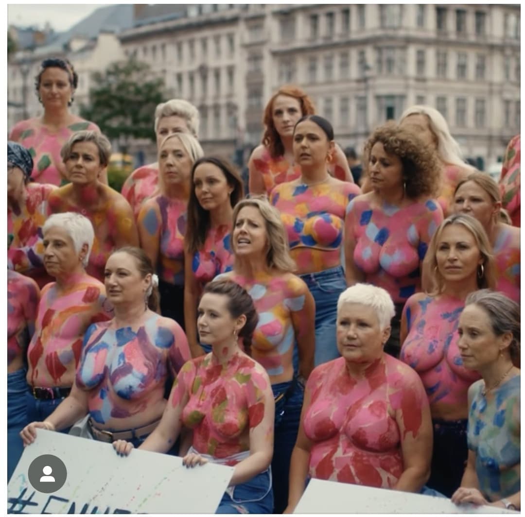 Click to view full size Sophie and friends topless cancer protest