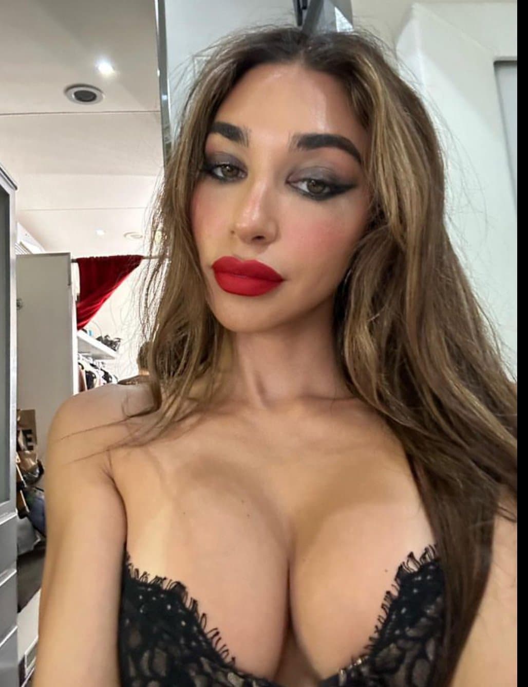 Click to view full size Of course no bra & tits out on her birthday. She’s always showing that rack off.