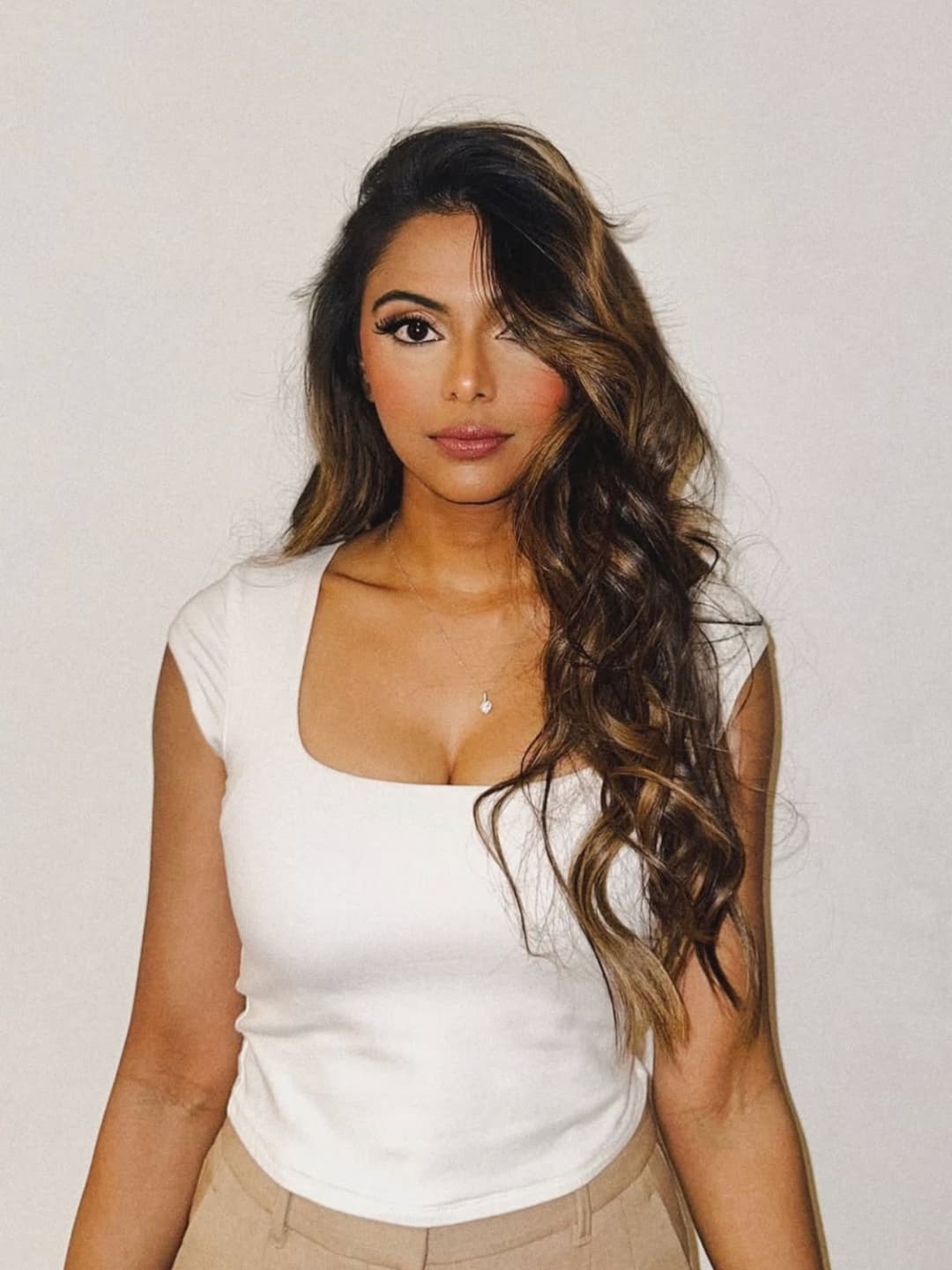 Click to view full size Emily Agard - Desi brown whore loves showing off those curry cannons & her feet for us to beat off