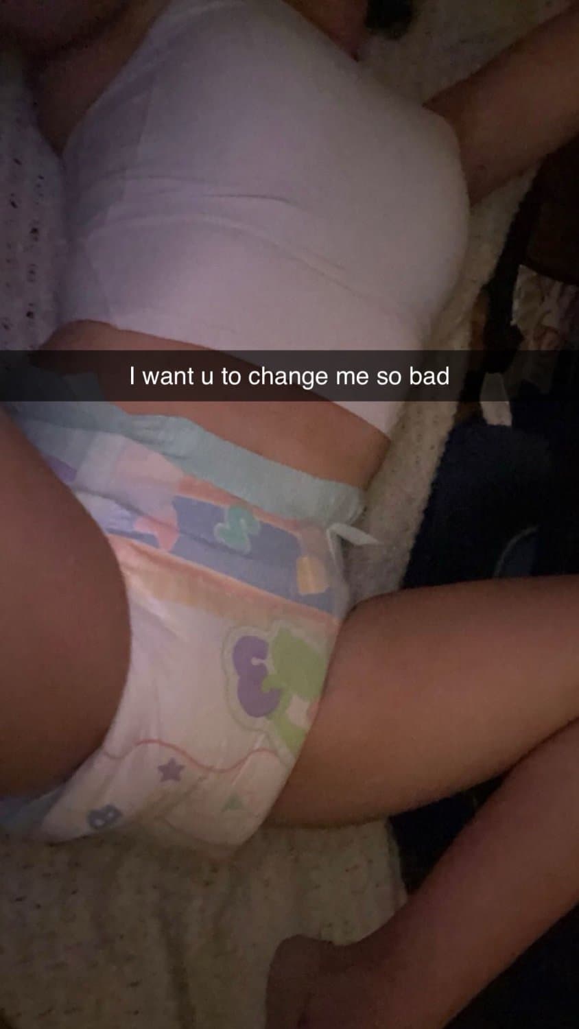 Click to view full size Hot amateur brunette shows her diapers on Snapchat