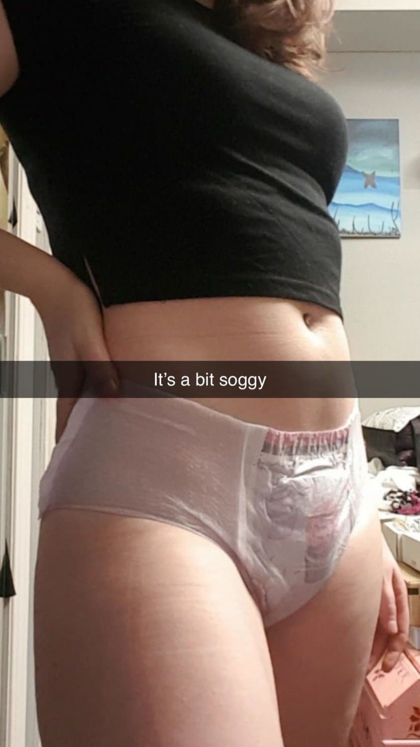 Click to view full size Cute redhead wears diapers for “anxiety”