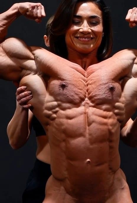 Click to view full size And a naked bodybuilder really loves her roided muscles to be worshipped by girls