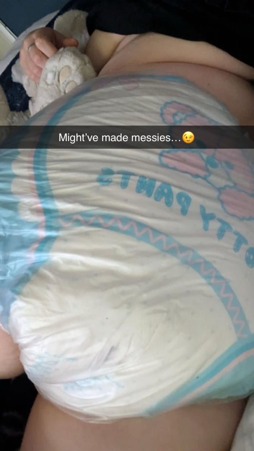 Click to view full size Incontinent college girl doesn’t mind showing off her diapers