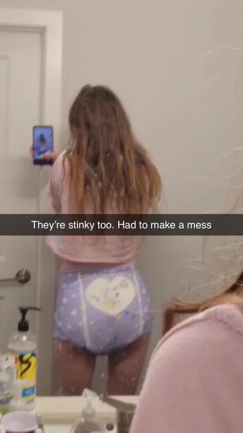 Click to view full size Hot amateur brunette shows her diapers on Snapchat