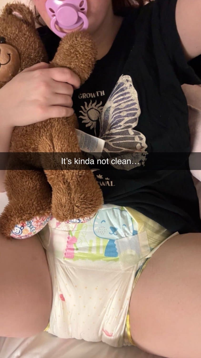 Click to view full size Incontinent college girl doesn’t mind showing off her diapers