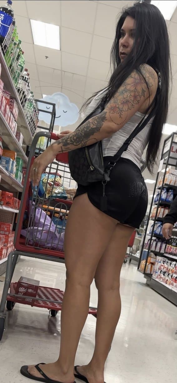 Click to view full size Latina, booty shorts, flip flops, bending over