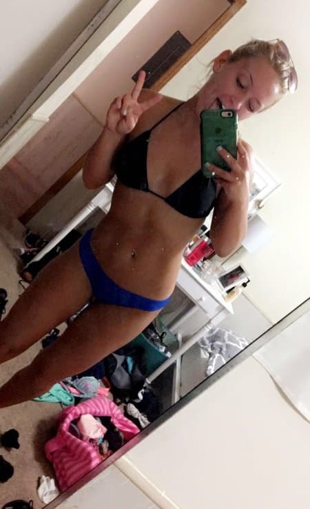 Click to view full size Brenna - perfect fitness slut with piercings showing off