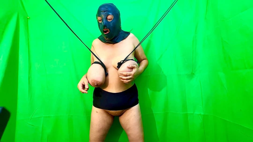 Click to view full size Gimp tit whipping