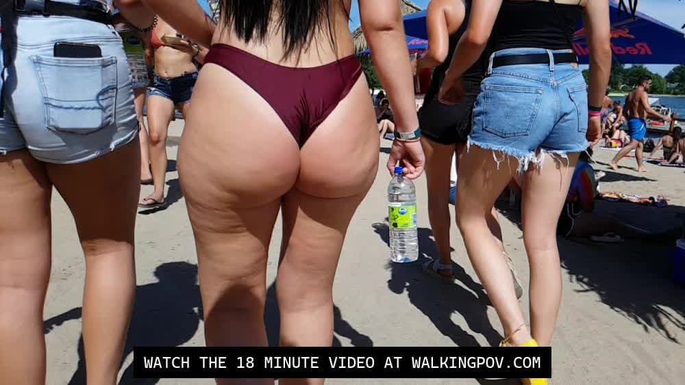 Click to view full size Following a Thong Bikini through the Beach Party
