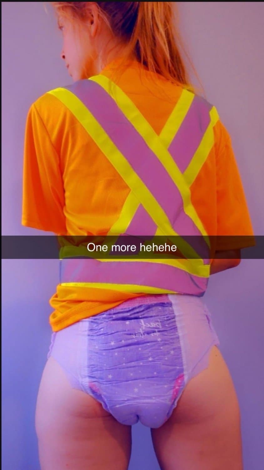 Click to view full size Cute redhead wears diapers for “anxiety”